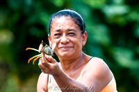 Woman showing Crab